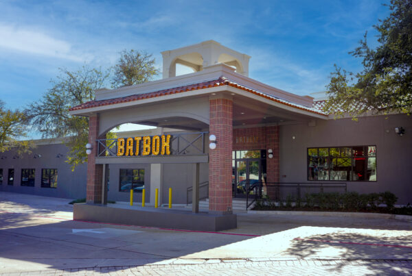 Front entrance of a Batbox location during the day.