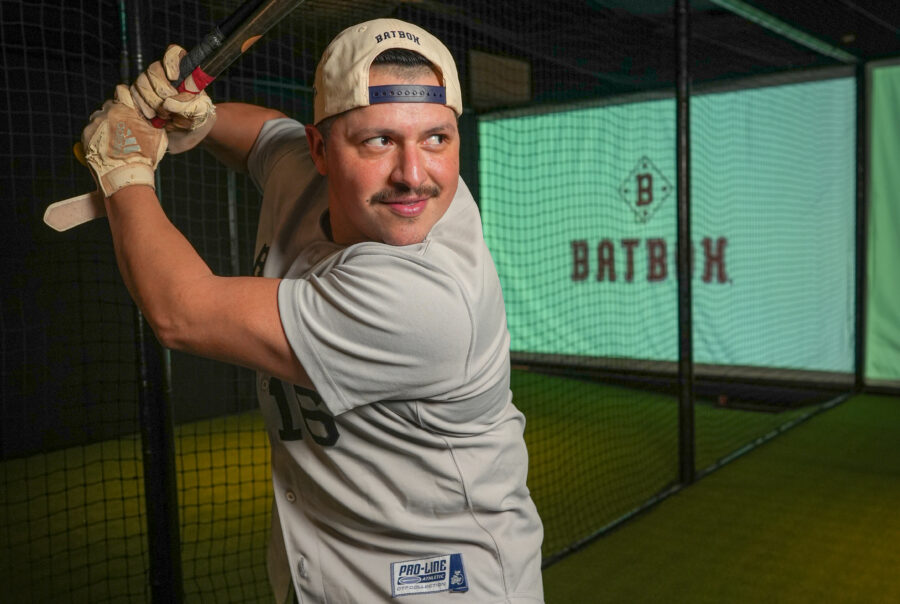 Baseball bar in Dallas featuring indoor batting simulator
